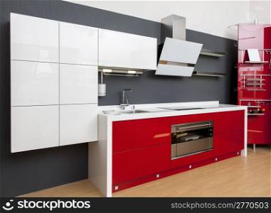 Modern kitchen interior with red decoration