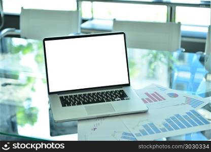 Modern Laptop With Blank Screen Pictures and business graphs