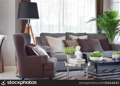 modern living room design with sofa and wooden lamp