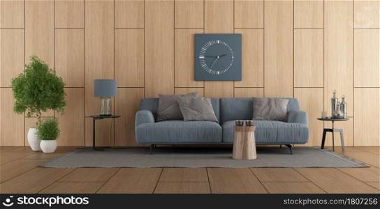Modern living room with blue sofa against wooden paneling-3d rendering. Wooden paneling in a modern living room with sofa