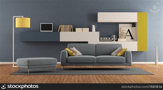 Modern living room with blue sofa and colorful bookcase on background - 3d rendering. Modern colorful living room