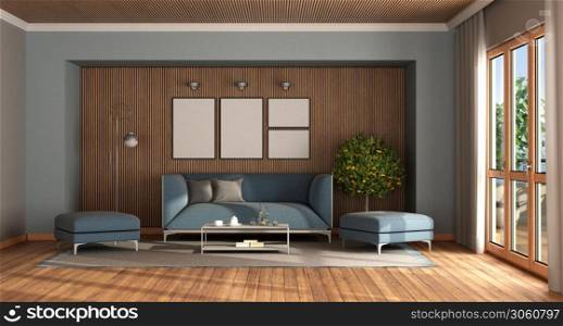 Modern living room with elegant blue sofa and footstool against wooden wall - 3d rendering. Modern living room with elegant blue sofa and footstool