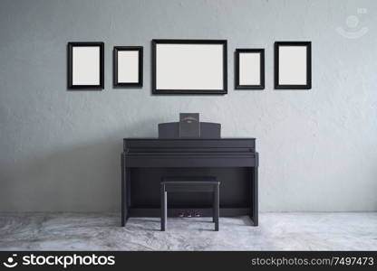 Modern living room with five empty picture frames ,piano and clock . cement floor and concrete wall , Interior Interior design with Loft style .