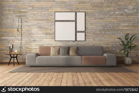 Modern living room with sofa coffee table and wall lamp against stone wall - 3d rendering. Minimalist living room with sofa against stone wall