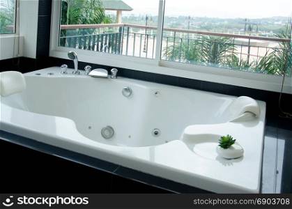 Modern luxury bathroom with bathtub.