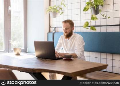 modern man working his laptop