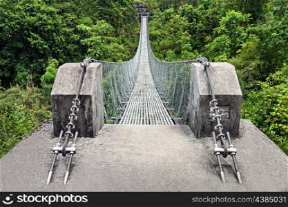 Modern metal bridge near Pokhara town, Nepal