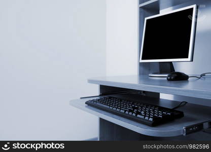 Modern new computer on wooden desk