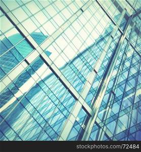Modern office building - architectural and business background. Retro style filtred image
