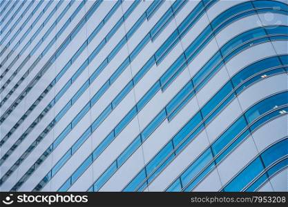 modern office building with blue glass facade