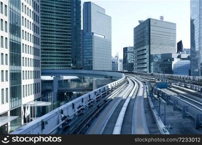 Modern office buildings from Yurikamome elevated monorail, Shinbashi district, Minato Ward, Tokyo, Kanto Region, Honshu, Japan