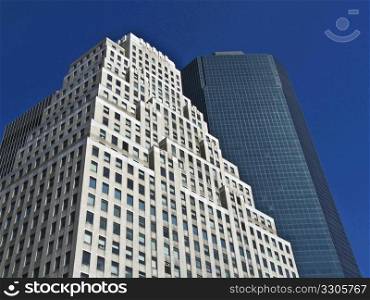modern office buildings rising high in Manhattan