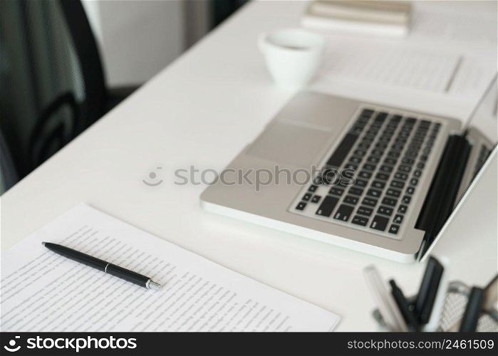 Modern office concept, Modern and simple business office desk setup with laptop and stationary.