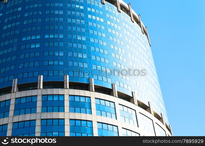 modern office tower from concrete and glass in sunny day