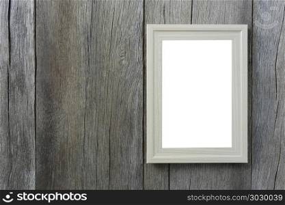 Modern Picture Frame on wooden wall.. Modern Picture Frame on wooden wall and have copyspace for design in your work.
