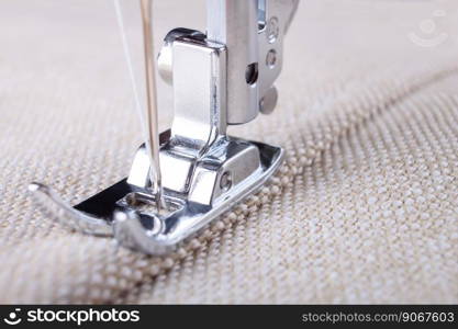Modern sewing machine presser foot with linen fabric and thread, closeup, copy space. Sewing process clothes, curtains, upholstery. Business, hobby, handmade, zero waste, recycling, repair concept. Modern sewing machine presser foot with item of clothing