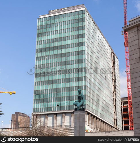 Modern skyscraper office building being demolished in Brussels