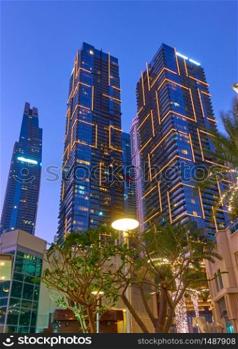 Modern skyscrapers of Dubai at night, United Arab Emirates