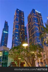 Modern skyscrapers of Dubai at night, United Arab Emirates