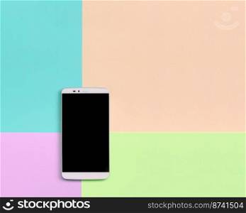 Modern smartphone with black screen on texture background of fashion pastel pink, blue, coral and lime colors paper in minimal concept.. Modern smartphone with black screen on texture background of fashion pastel pink, blue, coral and lime colors