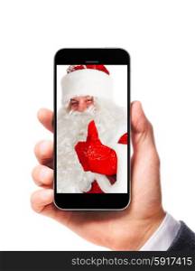 modern smartphone with santa claus on the screen in male hand isolated on white background. modern smartphone in hand