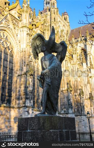 Modern statue of John the Baptist near the Cathedral in the Dutch city of Den Bosch. Netherlands