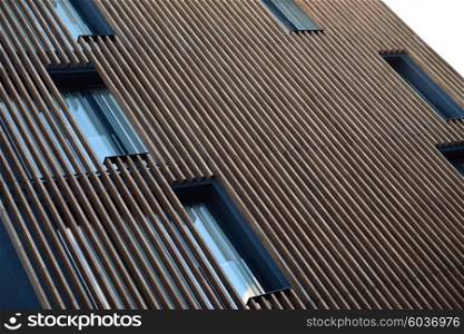 modern stripe wooden facade with windows