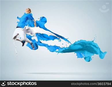 Modern style dancer jumping and paint splashes Illustration