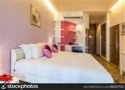 Modern style of bedroom with pink color tone in resort ,Thailand