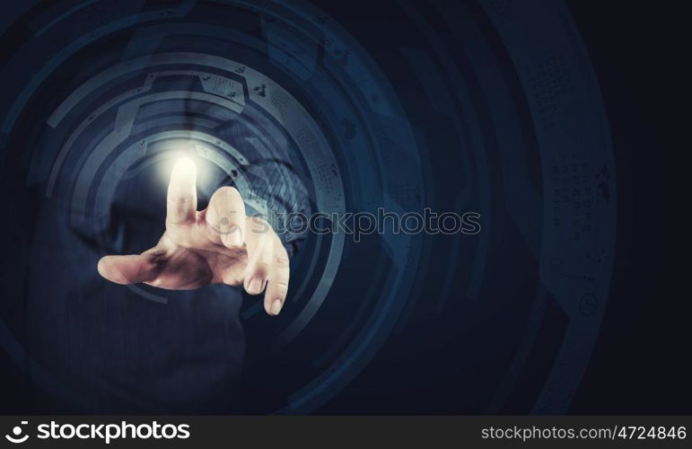 Modern technologies. Close up of businessman touching digital screen with finger