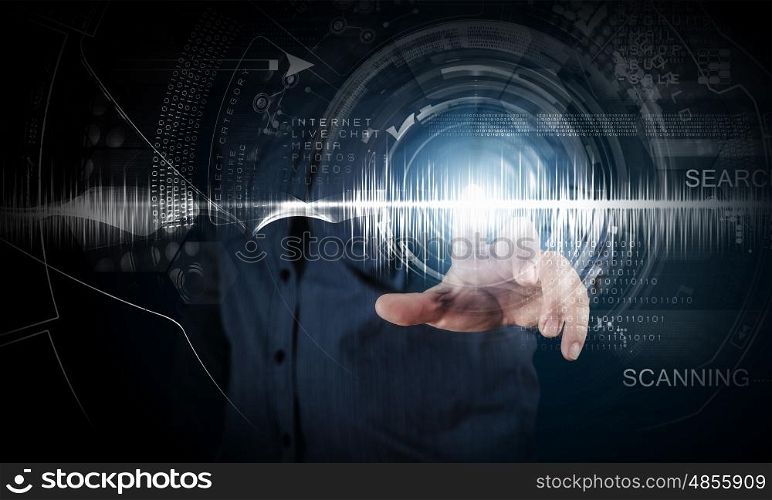 Modern technologies. Close up of businessman touching digital screen with finger