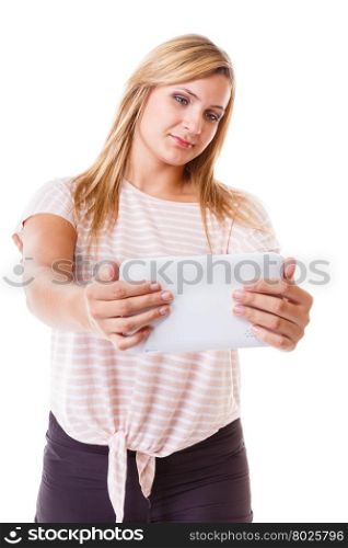 Modern technologies leisure and lifestyle concept. Young woman casual style girl with computer tablet isolated on white