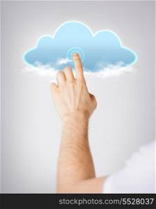 modern technology and cloud computing concept - closeup of man hand pointing at cloud