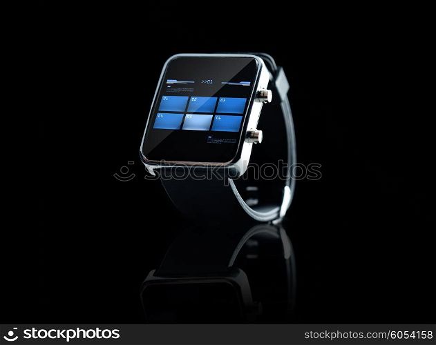 modern technology and object concept - close up of black smart watch with buttons on screen. close up of black smart watch interface