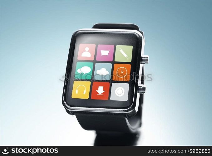 modern technology, application, object and media concept - close up of black smart watch with app icons on screen over blue background