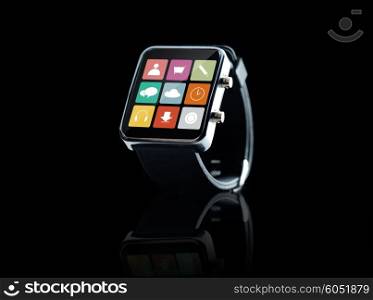 modern technology, application, object and media concept - close up of black smart watch with app icons on screen over black background