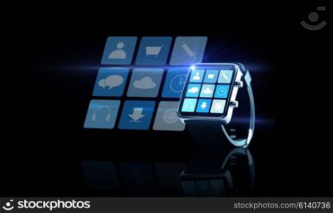 modern technology, application, object and media concept - close up of black smartwatch with app icons on screen over black background