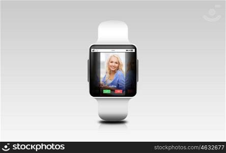 modern technology, communication, object and media concept - close up of black smart watch with incoming call on screen over gray background