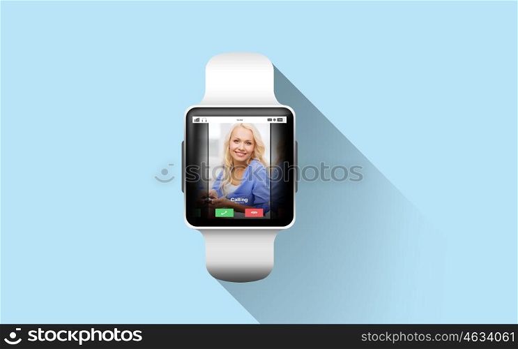 modern technology, communication, object and media concept - close up of black smart watch with incoming call on screen over blue background