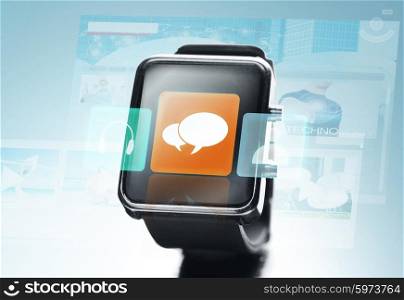 modern technology, communication, object and media concept - close up of black smart watch with text bubble icon on screen over blue background