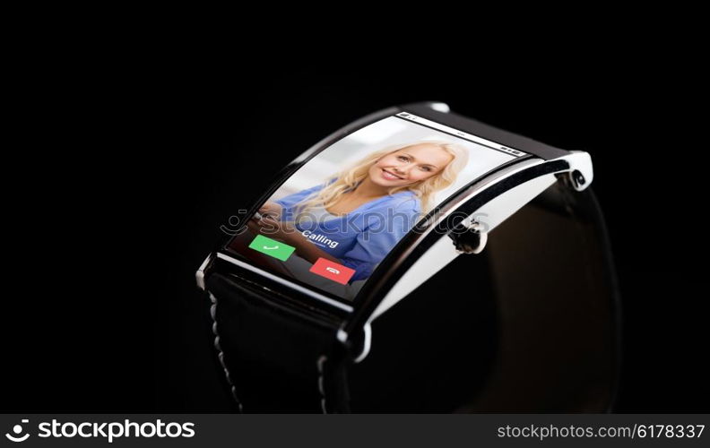 modern technology, communication, object and media concept - close up of black smart watch with incoming call