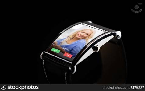 modern technology, communication, object and media concept - close up of black smart watch with incoming call