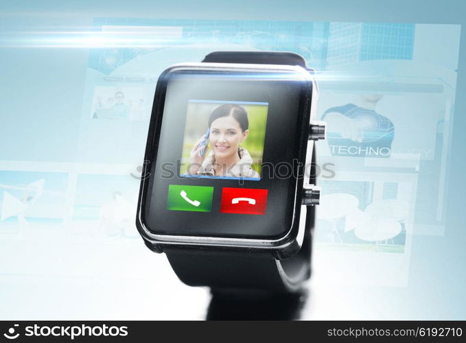 modern technology, communication, object and media concept - close up of black smart watch with video call contact icon and buttons over blue background