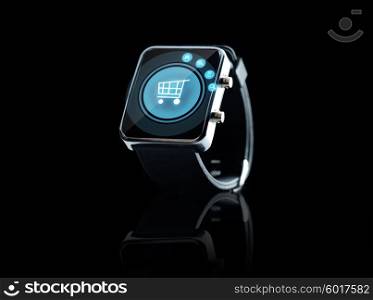 modern technology, consumerism, object and media concept - close up of black smart watch with shopping cart on screen