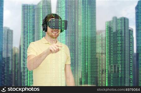 modern technology, cyberspace, entertainment and people concept - happy young man with virtual reality headset or 3d glasses playing game over city skyscrapers and binary code background. happy man in virtual reality headset or 3d glasses