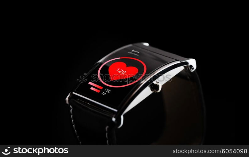 modern technology, health, object and media concept - close up of black smart watch with heart rate icon on screen