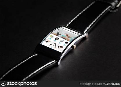 modern technology, internet shopping, object and media concept - close up of black smart watch with online shop web page on screen
