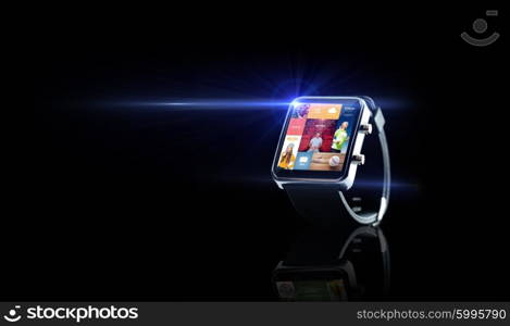 modern technology, mass media, object and media concept - close up of black smart watch with news application on screen