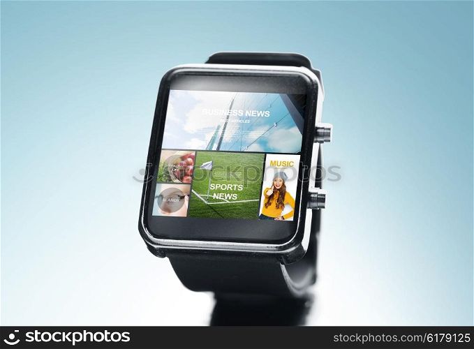 modern technology, mass media, object and media concept - close up of black smart watch with news application on screen over blue background