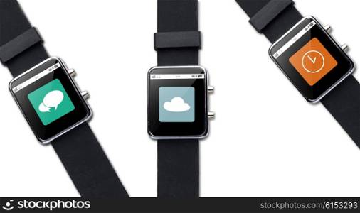 modern technology, object and media concept - close up of black smart watch with application icons on screen